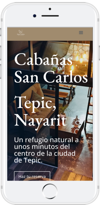 Iphone con pagina web de las Cabañas San Carlos